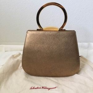 Authentic Ferragamo Gold Metallic Frame Handbag